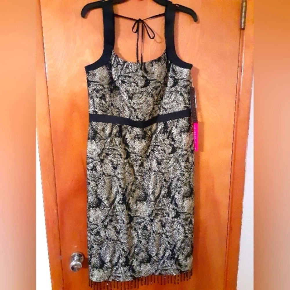 Black and gold mid length cocktail dress